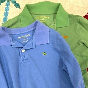 Two pre-owned long sleeve polo shirts size 6-7 in color green and color blue.